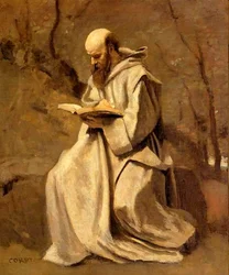 Monje leyendo un libro